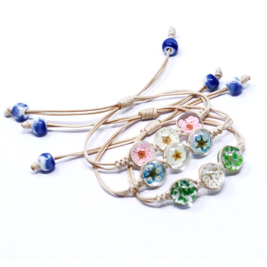 Pressade blommor - Armband med tre blommor