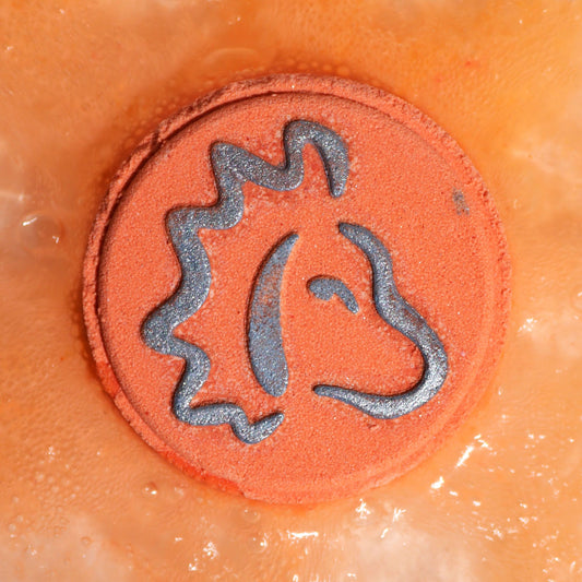 Uppsättning med stjärntecken-badbomber och horoskop – Lejonet